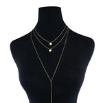 Colar Dourado Longo com Pingentes Minimalistas em Ouro 18k – Camadas de Elegância | Saint Carvalho