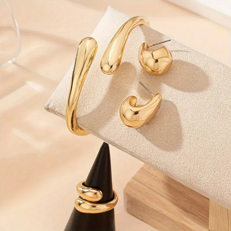 Conjunto Saint Carvalho Lumière — Pulseira, Anel e Brincos Dourados