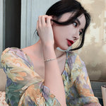 Pulseira Dourada Ajustável com Cristais – Elegância Minimalista | Saint Carvalho